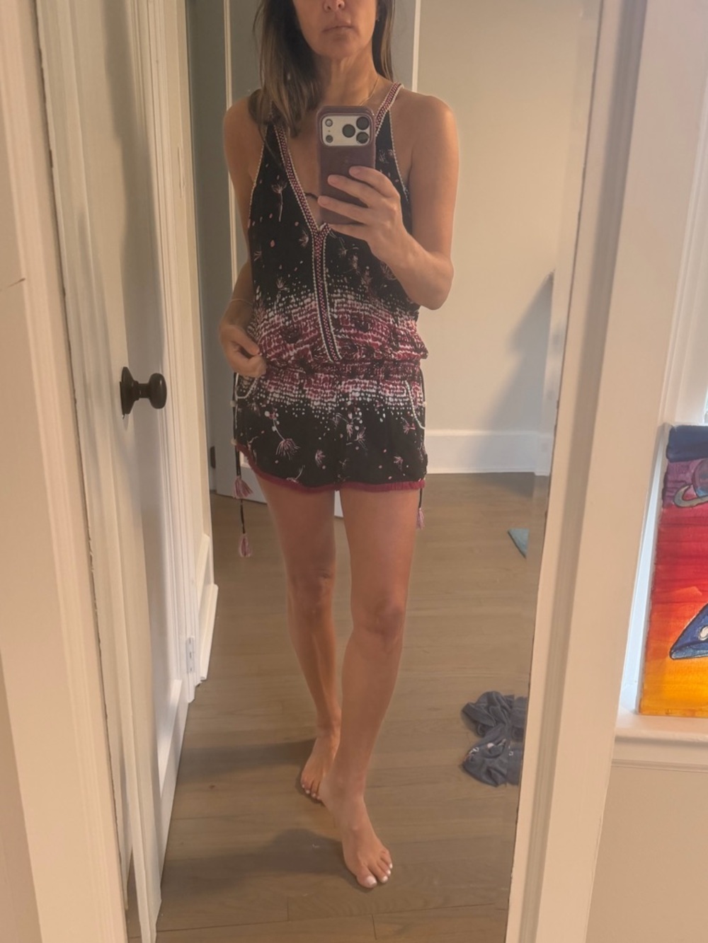 Poupette St. Barth Black and Pink Sleeveless V-Neck Mini romper with Side Ties